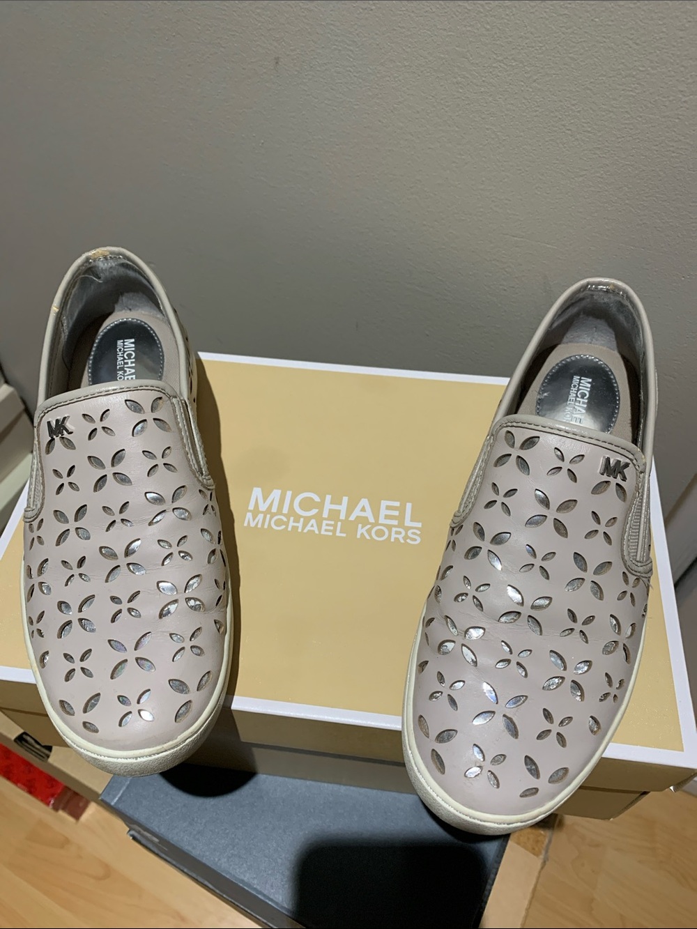 Michael Kors women’s Laser-Cut Slip-On Sneakers